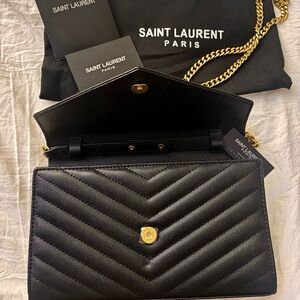 Saint Laurent Black Quilted Clutch with Gold Logo with dust bag